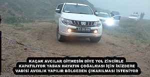 KAÇAK AVCILAR GİTMESİN DİYE YOL ZİNCİRLE KAPATILIYOR  YABAN HAYATIN ÇOĞALMASI İÇİN İKİZDERE VADİSİ AVCILIK YAPILIR BÖLGEDEN ÇIKARILMASI İSTENİYOR