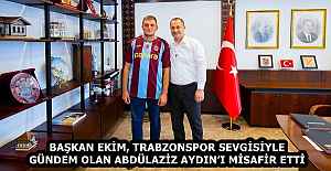BAŞKAN EKİM, TRABZONSPOR SEVGİSİYLE GÜNDEM OLAN ABDÜLAZİZ AYDIN’I MİSAFİR ETTİ
