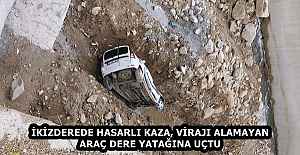 İKİZDEREDE HASARLI KAZA, VİRAJI ALAMAYAN ARAÇ DERE YATAĞINA UÇTU