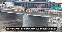 KÖPRÜ AYAĞI TAŞ KAPLAMA İLE TAKVİYE EDİLDİ