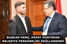 baskan_genc_hayat_kurtaran_belediye_personelini_odullendirdi_h47680_e56e2