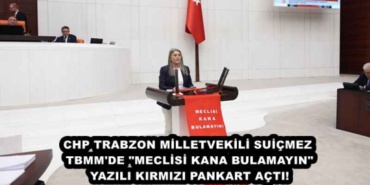 chp_trabzon_milletvekili_suicmez_tbmm_de_meclisi_kana_bulamayin_yazili_kirmizi_pankart_acti_h48418_b2cf8