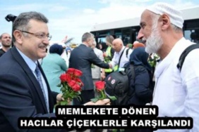 memlekete_donen_hacilar_ciceklerle_karsilandi_h48008_d3114