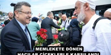 memlekete_donen_hacilar_ciceklerle_karsilandi_h48008_d3114
