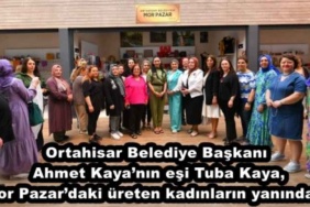 ortahisar_belediye_baskani_ahmet_kayanin_esi_tuba_kaya_mor_pazardaki_ureten_kadinlarin_yaninda_h47750_97ba6