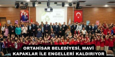 ortahisar_belediyesi_mavi_kapaklar_ile_engelleri_kaldiriyor_h53359_29c8e