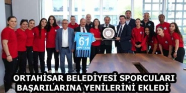 ortahisar_belediyesi_sporculari_basarilarina_yenilerini_ekledi_h58523_91699