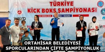 ortahisar_belediyesi_sporcularindan_cifte_sampiyonluk_h59078_4cd80