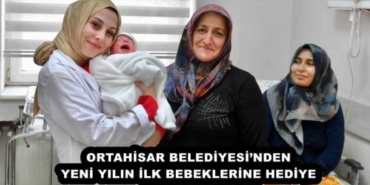 ortahisar_belediyesinden_yeni_yilin_ilk_bebeklerine_hediye_h56230_c0145