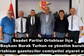 saadet_partisi_ortahisar_ilcebaskani_burak_turhan_veyonetim_kurulu_trabzon_ortahisar_gazeteciler_cemiyetini_ziyaret_etti_h53817_c9a80
