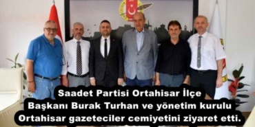 saadet_partisi_ortahisar_ilcebaskani_burak_turhan_veyonetim_kurulu_trabzon_ortahisar_gazeteciler_cemiyetini_ziyaret_etti_h53817_c9a80