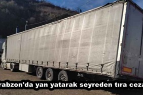 trabzon_da_yan_yatarak_seyreden_tira_ceza_h45586_8b64d