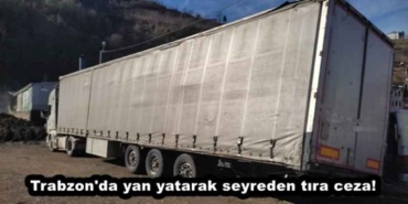 trabzon_da_yan_yatarak_seyreden_tira_ceza_h45586_8b64d