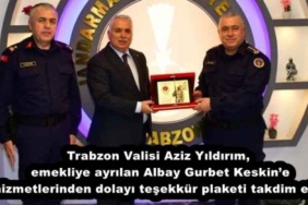 trabzon_valisi_aziz_yildirim_emekliye_ayrilan_albay_gurbet_keskine_hizmetlerinden_dolayi_tesekkur_plaketi_takdim_etti_h56099_1f158